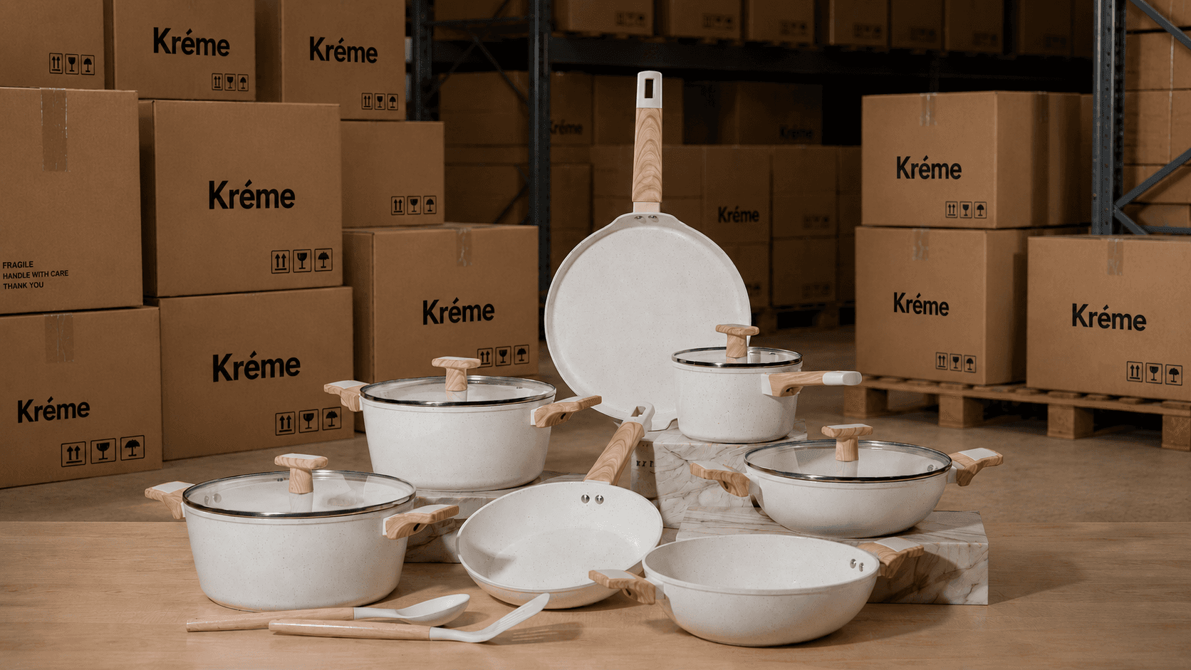 Kréme cookware and branded boxes in the workshop